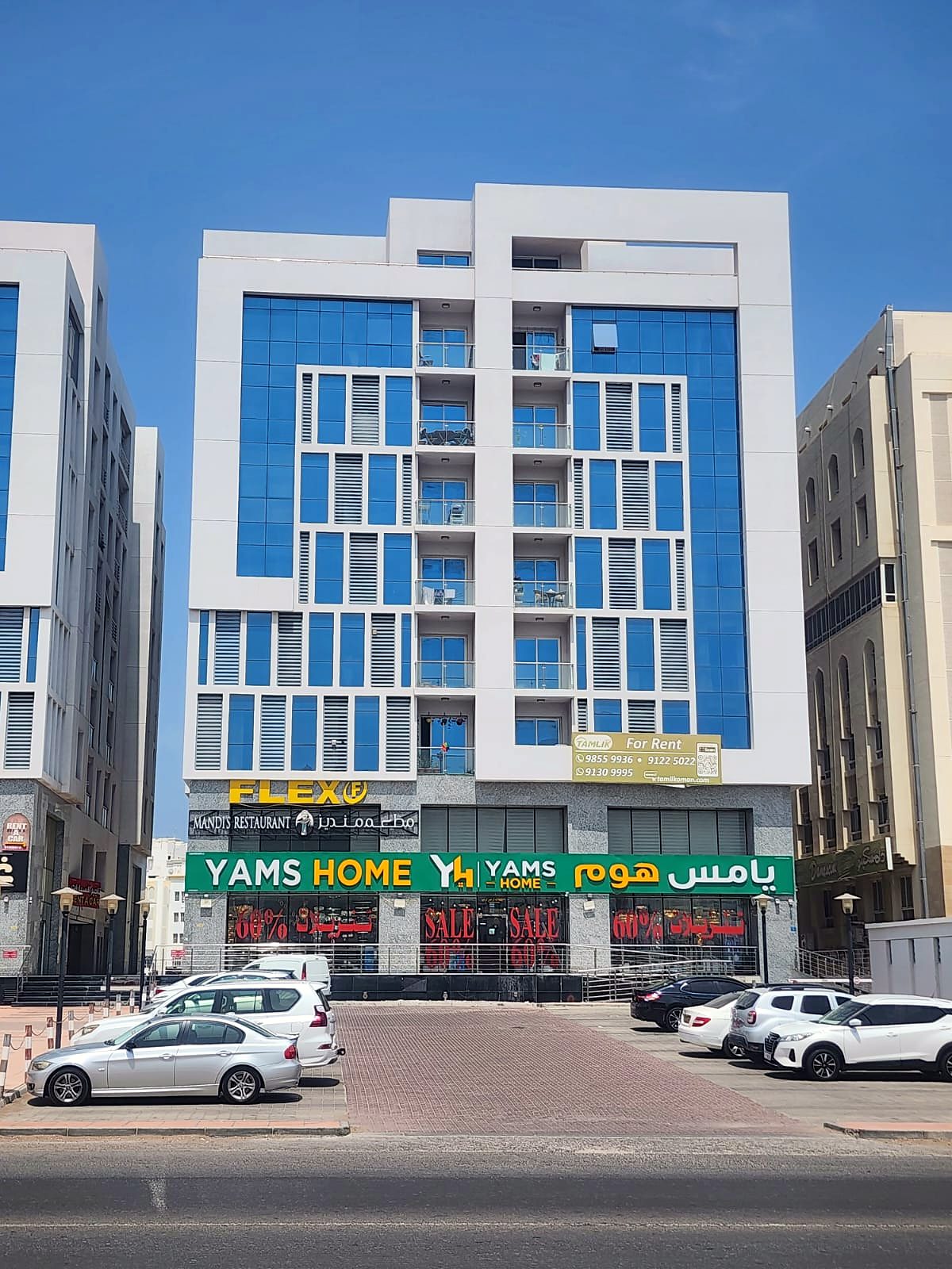 Twin Tower, Al Khuwair: the two towers and their street-level shops · 3